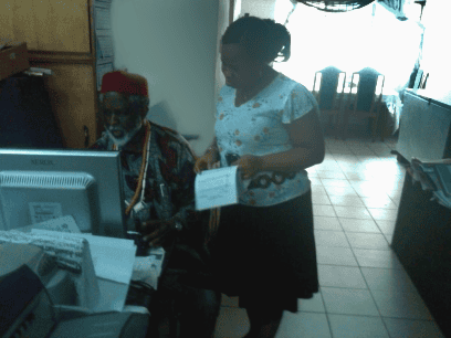 Picture 2. Laz Ekwueme, sharing his compositions with the researcher.